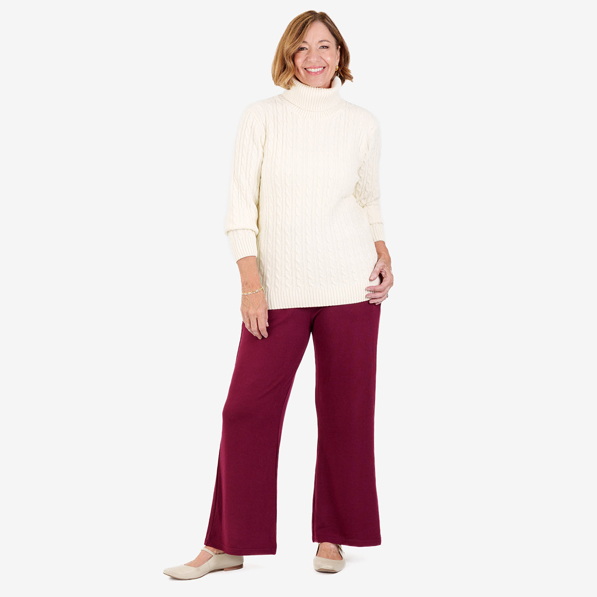 Pull femme col roulé à torsades avec manches longues et finitions côtelées