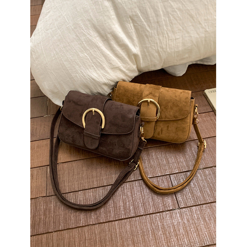 Sac à bandoulière élégant en daim