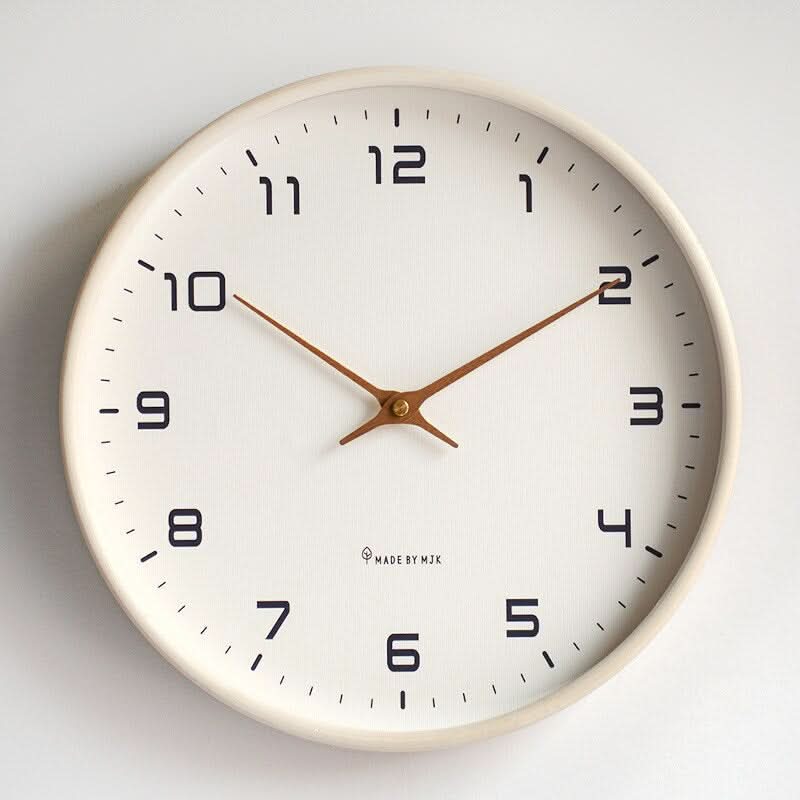 Horloge murale en bois silencieuse au design scandinave