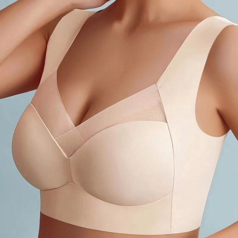 Détail du décolleté en V profond avec maille transparente